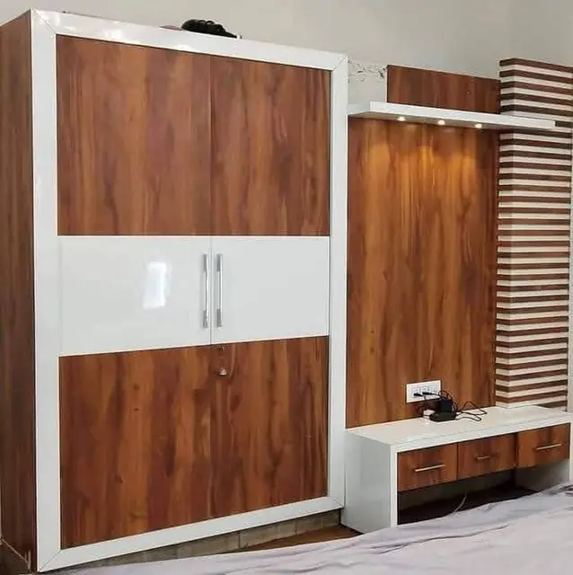 Wood and white almirah with TV console – Almirah by Varnika Furnitures and Aluminium Works, Lucknow