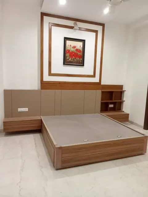Platform bed with panelled headboard – Bed by Varnika Furnitures and Aluminium Works, Lucknow