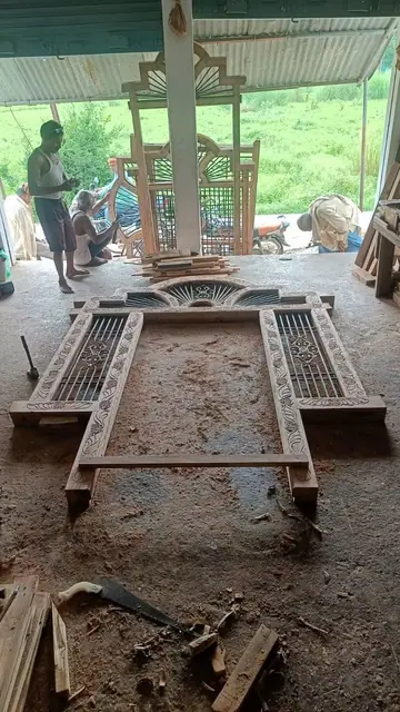 Hand-carved main door frame under construction