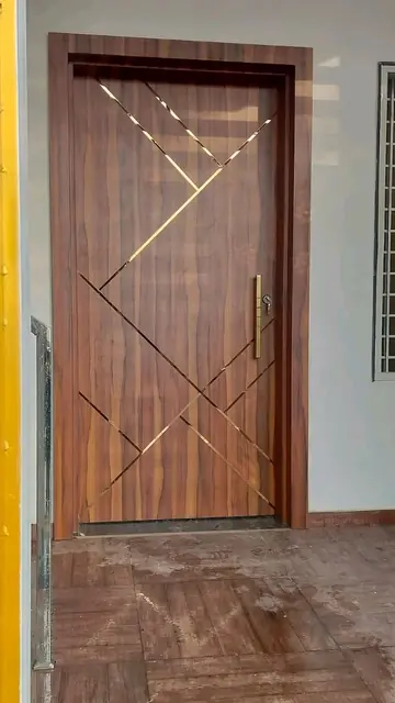 Teak-finish flush door with brass inlay lines – Single Door Gate by Varnika Furnitures and Aluminium Works, Lucknow