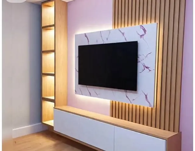Marble-effect TV wall with fluted panels – TV Unit by Varnika Furnitures and Aluminium Works, Lucknow