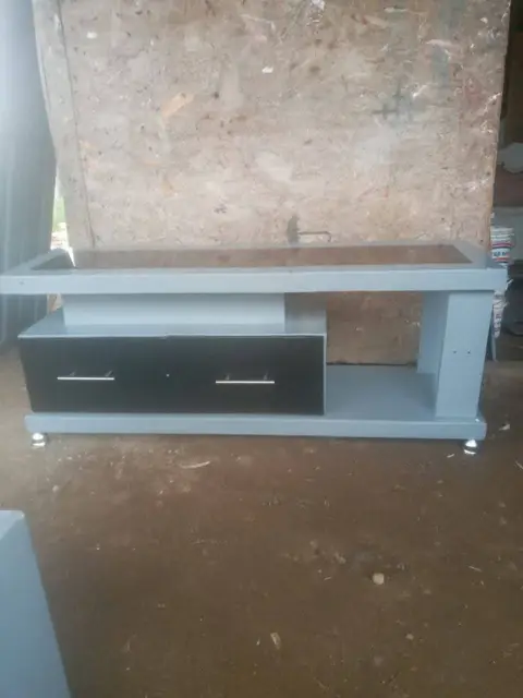 Grey TV console with drawers – TV Unit by Varnika Furnitures and Aluminium Works, Lucknow
