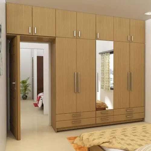 Floor-to-ceiling wardrobe around door – Wardrobe by Varnika Furnitures and Aluminium Works, Lucknow