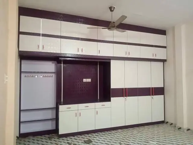 Purple and white wardrobe wall – Wardrobe by Varnika Furnitures and Aluminium Works, Lucknow