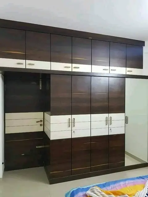 Dark walnut and white wardrobe – Wardrobe by Varnika Furnitures and Aluminium Works, Lucknow