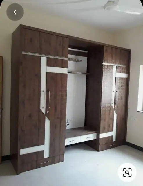 Textured wardrobe with open hanging – Wardrobe by Varnika Furnitures and Aluminium Works, Lucknow