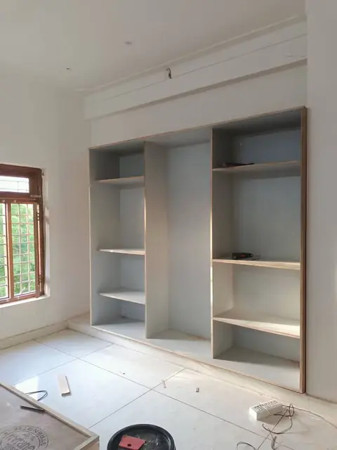 Wardrobe carcass being fitted on site by our carpenter